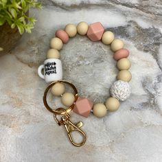 Soft silicone beads pair with keychain + accent bead Thick, stretchy cord allows for it to slip onto your wrist.About 3” opening, but stretches for any wrist size. Ready To Ship Coffee Teach Repeat, Animal Pen, Bracelet Keychain, Neoprene Tote, Silicone Bracelets, Mini Pouches, Wallet Pouch, Cream Blush, Genuine Leather Bags