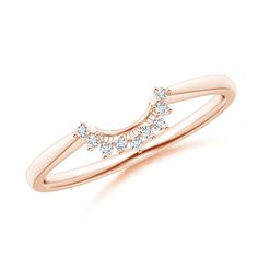 a rose gold ring with three diamonds