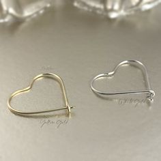 Lightweight, open heart-shaped wire hoop earrings handcrafted in 10K solid gold. Treat yourself with some love. Ships within 3 business days. - Earring size: 18mm - Wire thickness: 0.7mm - Sold as A Pair. - Made in 10 karat gold. - Stamp with 10K. Wire Hoop Earrings, Open Heart, Wire Earrings, Gold Heart, Heart Of Gold, Treat Yourself, Solid Gold, Hoop Earrings, Stamp