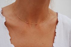 Delicate gold 18k necklace with rose quartz and minimalist design, chain measure: 42 cms (16-17/32 inin) with extension to lengthen (15 mm) 0-19/32 inin Elegant Pink Chain Necklace With Delicate Chain, Dainty Pink Necklace With Delicate Chain, Dainty Pink Jewelry With Delicate Chain, Elegant Pink 14k Gold Filled Necklaces, Elegant Pink 14k Gold-filled Necklace, Elegant Pink 14k Gold Filled Necklace, Pink Minimalist Necklace With Delicate Chain, Minimalist Pink Clavicle Chain Necklace, Elegant Pink Necklace For Everyday Wear