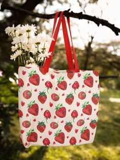 "Our strawberry tote bag will hold your everyday essentials while you're on the go. * 16\" x 20\" 100% polyester * Maximum weight limit - 44lbs * Large inside pocket with contrast fabric * Comfortable cotton webbing handles * Vibrant colors that won't fade" Aesthetic Farmers Market, Strawberry Accessories, Strawberry Clothing, Slytherin Fashion, Tote Bag Aesthetic, Farmers Market Bag, Strawberry Patch, Bag Aesthetic, Cute Strawberry