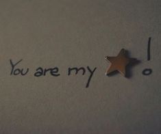 the word you are my is written on a piece of paper next to a star