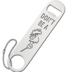 a bottle opener with a chain on it that says don't be a rooster