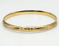 14K Yellow Gold Child Size Bangle Bracelet Size 6 A perfect gift for your loved one for any special occasion or holiday!  Total Bracelet Weight: 3.70g Bracelet Width: 4.21mm Bracelet Closure: Hinge Item will be placed into a gift box. * 14k Stamped Round Gold Bracelet For Wedding, 14k Stamped Bangle Bracelet For Anniversary, Classic Diamond Cut Cuff Bracelet For Gift, 14k Yellow Gold Bangle For Anniversary, Gold Stamped 14k Bangle For Gift, Classic Diamond Cut Cuff Bracelet As Gift, Anniversary Gold Bracelet Hallmarked Round Shape, Gold Bracelet With Polished Finish For Anniversary, Round Gold Bracelet With Polished Finish For Anniversary