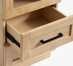 a wooden cabinet with two drawers and an open drawer on the bottom one has a black handle