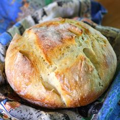 a loaf of bread sitting on top of a blue cloth