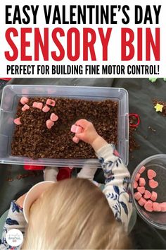 a young boy is playing with his homemade valentine's day sensory bin for building fine motor control