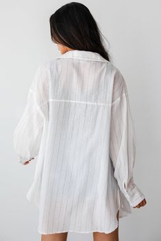 Look effortlessly cute for any casual occasion with a wardrobe essential like the Natural Sweetheart Pinstripe Oversized Button-Up Blouse! Effortlessly combining timeless sophistication with contemporary flair, this blouse is the epitome of chic versatility. Crafted from high-quality fabric, this blouse boasts a luxurious feel and impeccable craftsmanship. The oversized silhouette offers a relaxed fit that drapes elegantly over the body, creating a look that's both stylish and comfortable. The s