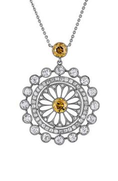 Round-cut brown diamonds center and top this elegant filigree pendant filled with white diamonds and strung upon a dainty 18-karat white-gold chain. 17 1/2" length Total diamond weight: 1.10ct. Color: G–H Clarity: VS 18k-white gold/diamond/brown diamond Made in the USA >Diamond Guide Luxury Platinum Necklace With Rose Cut Diamonds, Luxury Rose Cut Diamond Necklace In Platinum, Diamond Filigree Round Pendant Jewelry, Diamond Filigree Pendant Jewelry, Filigree Diamond Pendant Jewelry, Elegant Medallion Diamond Necklace With Diamond Accents, Diamond Medallion Necklace For Wedding, Rose Cut Diamond Pendant Necklace, Wedding Diamond Medallion Necklace