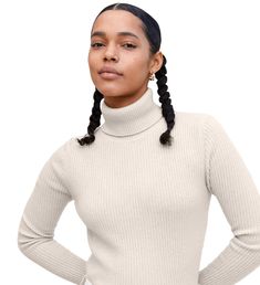 Undyed White Classic Fitted Sweater For Layering, Fitted Beige Turtleneck For Winter, Classic Ribbed Long Sleeve Turtleneck, Classic Relaxed Fit Ribbed Sweater, Classic Stretch Beige Sweater, Classic Beige Stretch Sweater, Classic Spring Turtleneck For Workwear, Classic Spring Turtleneck With Ribbed Collar, Classic Ribbed Collar Turtleneck For Spring