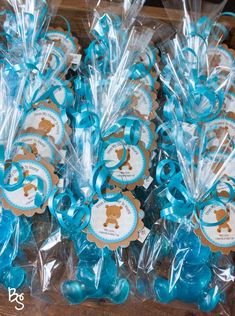 blue and brown baby shower favors in plastic bags