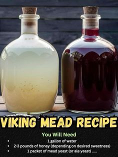 two large bottles filled with liquid sitting next to each other on a wooden table and the words viking mead recipe written below