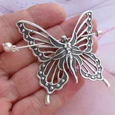 "A beautiful and versatile faerie butterfly pin accessory! Shawl pin, scarf pin, hair slide, it can do it all. This piece has a professionally oxidized silver plating over solid brass, making it a sturdy piece.  The stick pin will go through several different slots. Stamping is 2.25\". Stlk pin is 2.5\" -All components of my jewelry are made without lead and nickle. -All sterling silver is 925, nothing less. It is also tested on a regular basis for strength. -All rhodium/silver/gold/bronze/gunmetal plates are quality pieces. -All of my chain (links) is soldered! (including plated chains) -Best of all, since I am particular about my components, I love to shop for supplies and search out the highest quality for the best price, resulting in elegant and affordable handmade jewelry for you! :)" Fairy Sweater, Butterfly Shawl, Silver Shawl, Silver Scarf, Pin Fashion, Sweater Pin, Pin Hair, Shawl Pin, Butterfly Pin