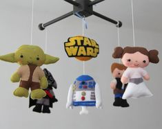 star wars mobiles are hanging from the ceiling