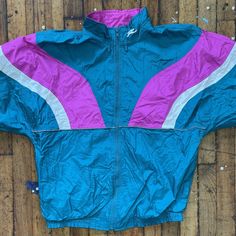 Vintage Road Runner Sports Multicolored Large Full Zip Nylon Windbreaker Jacket Sizes might vary in comparison to current day sizes  so please see photos for measurements and flaws before you purchase. These are mostly vintage items and so please keep in mind that  anything over 10 years old is most likely going to have some fading,  cracking, staining and small snags or holes.  We try and mention and photograph any flaws but sometimes might miss one. *These items are used, and sourced from a va Green Nylon Sporty Track Jacket, 90s Style Sports Windbreaker For Fall, Nylon Sportswear Windbreaker For Sports Season, 90s Style Fall Sports Windbreaker, Sportswear Nylon Windbreaker For Sports Season, Sporty Green Nylon Track Jacket, Green Color Block Windbreaker For Streetwear, Nylon Windbreaker For Sports Season, 90s Style Nylon Long Sleeve Windbreaker