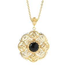 A floral motif of filigree beauty! This filigree pendant features your choice of a center black onyx or white howlite stone. Surrounding the center stone are wonderful floral motifs with the bail showing beautiful beadwork and cut-outs. 18K Yellow Gold Plated Bronze 2-1/4”L x 1-5/8”W x 3/8”H One round 12mm cabochon Chain: 36"L Luxury Filigree Flower Pendant Jewelry, Luxury Filigree Round Pendant Jewelry, Beautiful Beadwork, Howlite Stone, Turkish Jewelry, Filigree Pendant, White Howlite, Floral Motif, Black Onyx