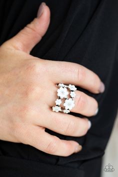 A collection of shiny white flowers delicately connect across the finger, creating a colorful layered look for a seasonal flair. Features a dainty stretchy band for a flexible fit.

 Sold as one individual ring. White Flower Ring, Dainty Band, Floral Crowns, Crown Ring, Whimsical Fashion, Floral Accessories, White Bouquet, Black Flowers, Paparazzi Accessories