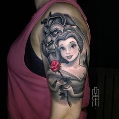 a woman with a rose tattoo on her arm