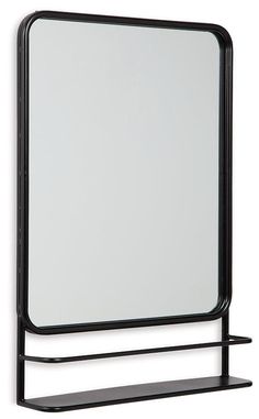 a black shelf with a mirror on it