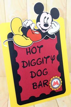 a hot diggitty dog bar sign with mickey mouse