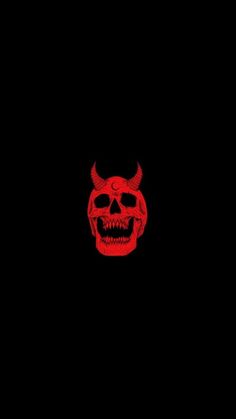 a red skull with horns on it's head is seen in the dark sky