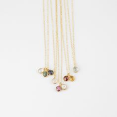 The Gema Necklace is crafted with a semi-precious gemstone suspended on a delicate chain. It features a natural and genuine gemstone. Showcasing stunning elegance and unique style, this birthstone necklace makes a perfect gift or personal keepsake. Gemstone size: Approximately 7x5mm Materials: 14K Gold Filled, Vermeil SHOP POLICY Non-returnable items: Earrings Personalized Items Items on sale FINAL SALE: Unpersonalized orders placed within the context of a site-wide sale or any kind of discount Elegant Birthstone Necklace With Natural Stones For Everyday, Elegant Everyday Birthstone Necklace With Natural Stones, Delicate Charm Necklaces With Natural Stones For Gift, Delicate Natural Stones Charm Necklace For Gift, Delicate Charm Necklace With Natural Stones For Gifts, Teardrop Birthstone Gemstones For Gifts, Dainty Gemstone Pendant Charm Necklaces, Dainty Charm Necklaces With Gemstone Pendant, Dainty Gemstone Charm Pendant Necklace