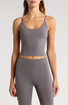 Narrow straps give a cami-hybrid look to a superstretchy tank ideal for workouts and active days. Scoop neck Adjustable straps Partially lined, with pockets to accommodate bra pads 75% nylon, 25% spandex Machine wash, tumble dry Imported Sports Tops With Built-in Bra And Spaghetti Straps, Training Tank Top With Built-in Bra And Wide Straps, Casual Activewear With Built-in Bra And Wide Straps, Athleisure Tank Top With Built-in Bra And Medium Support, Versatile Activewear With Built-in Bra And Tank Straps, Sports Tank Top With Built-in Bra And Wide Straps, Yoga Tank Top With Built-in Bra, Compression Tank Top With Built-in Bra For Yoga, Cami Sports Bra With Built-in Bra For Gym