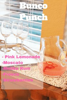 pink lemonade, moscato, and mulled rum are on the table