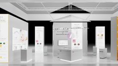 an exhibition stand with multiple displays on the wall and in the center, there is a large screen displaying information about skin care