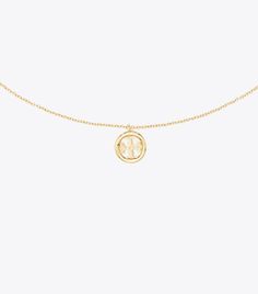 Women's Designer Jewelry | Tory Burch | Tory Burch Gold Medallion Necklace With Logo Charm, Gold Necklace With Initial Pendant And Logo Charm, Gold Pendant Chain Necklace With Logo Charm, Gold Pendant Necklace With Logo Charm, Yellow Gold Medallion Necklace With Logo Charm, Elegant Yellow Gold Charm Necklace With Logo, Gold Necklace With Logo Charm And Round Pendant, Gold Initial Pendant Charm Necklace With Logo, Yellow Gold Medallion Jewelry With Logo Charm