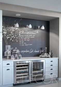 a chalkboard with writing on it in a kitchen