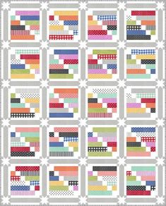 a quilt with different colors and patterns on it