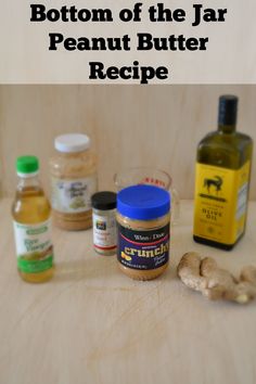 the ingredients for this peanut butter recipe are displayed on a wooden surface with text that reads, bottom of the jar peanut butter recipe