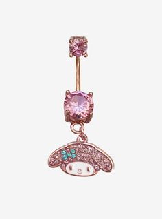 a pink belly ring with an embellishment in the shape of a lips and tongue