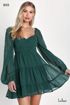 You're certain to fall for the Lulus Longing And Love Emerald Swiss Dot Puff Long Sleeve Mini Dressâ€”and once you've got it, everyone else will be falling for you! Lightweight woven fabric, embellished with Swiss dots, forms a bustier-inspired bodice with a sweetheart neckline and sheer balloon sleeves with elastic at the shoulders and cuffs. A high set-in waist tops the two-tiered mini skirt, falling to a ruffled hem. Double ties across the open back give this dress a flirty and fun finish. Hidden back zipper/clasp. Fit: This garment fits true to size. Length: Above mid-thigh. Size medium measures 31.5" from shoulder to hem. Bust: Great for any cup size. Waist: Fitted - elastic waist allows stretch. Hip: Not Fitted - fuller skirt allows room for hips. Undergarments: May be worn with an a Long Sleeve Hoco Dress, Winter Dance Dresses, Puff Long Sleeves, Long Sleeve Short Dress, Grad Dresses, Mini Sweater Dress, Hoco Dresses, Swiss Dot, Dresses For Teens