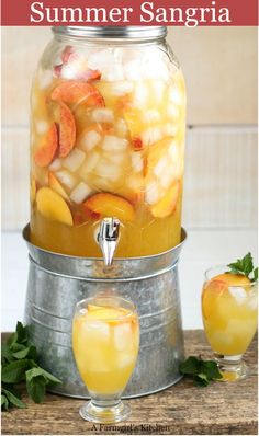 a glass jar filled with fruit and water