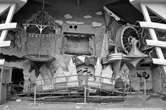 an old photo of a building that looks like it has been torn down and is in disrepair