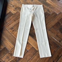 - Designer = Maxmara - Size = 10 - Msrp =$535 - Maxmara Made In Italy Size 10 Gaeta Plain Front Ecru Color Unhemmed Long Trouser - Inseam = - Rise = - Waist Circumference = Luxury White Workwear Pants, Luxury White Pants For Workwear, Elegant Off White Workwear Pants, Cream Workwear Pants With Pressed Crease, Elegant Fitted Off-white Bottoms, Cream Pants With Pressed Crease For Work, Elegant Fitted Off White Bottoms, Fitted Cream Classic Pants, White Luxury Pants