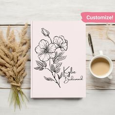 a coffee cup and some flowers on a white wooden table with the words, customize