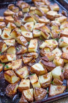 cooked potatoes on a baking sheet ready to be served