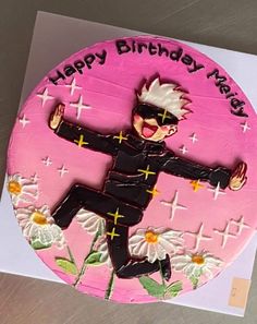 a birthday cake that is decorated with an image of a man in black and white