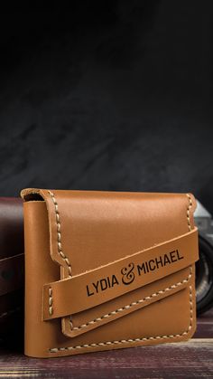 Shop now at Egonula for the best personalized leather gifts, including the Personalized Handmade Leather Bold Wallet. Our products are not just products but reflections of our passion for quality and craftsmanship. Celebrate family day, St. Patrick's Day, teacher appreciation day, Father's Day, grandparents' day, Thanksgiving, Halloween, Noel, birthdays, wedding anniversaries, dating anniversaries, and all celebrations with Egonula's handmade leather products. Folded Money, Men's Gifts, Hobbies For Men, Secret Compartment, Handmade Leather Wallet, Guitar Pick, Leather Handmade, Hand Stitching, Leather Wallet