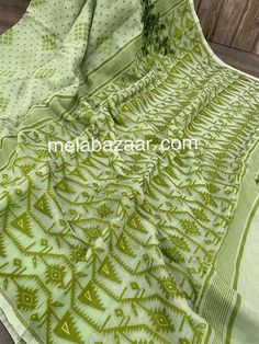 *Dhakai Jamdani  light green saree with zari highlights. *Fall attached. Eid Green Chanderi Saree, Green Chanderi Saree For Eid, Green Handloom Dupatta, Traditional Green Handloom Saree, Green Saree For Eid, Green Handloom Unstitched Dupatta, Green Self-design Dupatta For Puja, Traditional Light Green Semi-stitched Dupatta, Traditional Light Green Dupatta For Festivals