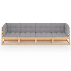 a gray couch sitting on top of a wooden frame