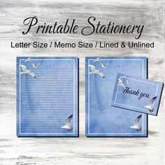 a set of two blue notepads with seagulls flying over them and the words printable stationery