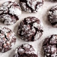 chocolate crinkle cookies on a baking sheet