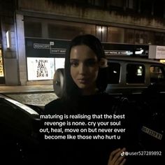 a woman sitting in the back of a car with a quote on it that reads, maturing is reading that the best revenge