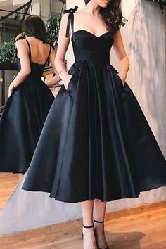 Black A-line Dress With Adjustable Straps, Elegant Black Suspender Dress With Corset Back, Black Suspender Dress For Prom, Elegant Black Suspender Dress For Prom, Black A-line Suspender Dress For Evening, Black Suspender Dress With Spaghetti Straps For Prom, Black Sleeveless Suspender Dress With Corset Back, Formal Black Dress With Pockets, Formal Black Dresses With Pockets