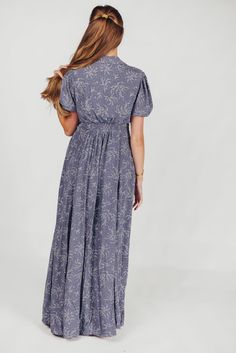 This gorgeous, feminine maxi is the easiest thing to wear for summer holidays and backyard barbeques. We love its lightweight ease and elegant floral pattern, and its front button placket gives it a classic quality you'll love wearing year after year. Available in two colorways. FIT: Runs true to size. MATERIAL: Viscose. GARMENT DETAILS: Lightweight floral maxi dress with a full front button placket, collared V-neckline, and short sleeves. Features a pleated front, in-seam pockets, and lining. S Relaxed Fit Maxi Dress For Spring, Spring Beach Button-up Maxi Dress, Summer Button-up Relaxed Fit Maxi Dress, Summer Maxi Dress With Relaxed Fit And Button-up, Summer Relaxed Fit Button-up Maxi Dress, Modest Fitted Maxi Dress For Vacation, Elegant Ditsy Floral Print Maxi Dress For Vacation, Flowy Spring Maxi Dress With Button Closure, Floral Print Button-up Midi Dress For Vacation