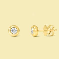 The Cloud, Bezel-Set Round Diamond Stud Earrings are handcrafted in 14K gold, 18K gold, or Platinum. Take your style game to the next level with The Cloud, Bezel-Set Round Diamond Stud Earrings. Designed for jewelry lovers, these stylish stud earrings are perfect for flaunting on their own, adding to your ear party, or wearing as a duo for an effortlessly chic look. Make a statement and show off your unique flair with this luxurious accessory. // Details //• Style Name: Cloud• Item Type: Studs• Setting Type: Bezel• Metal: 14K gold, 18K gold, or Platinum• Stone: Lab-grown or Earth-mined Diamond• Shape: Round• Cut: Brilliant-cut• Handmade to order // Custom Order //Want something that is truly unique and custom-made to fit your style? Any detail, color, cut, carat size, stone, or setting det Luxury Yellow Gold Earrings With Bezel Setting, Gold-plated Yellow Gold Brilliant Cut Diamond Earrings, Yellow Gold Plated Brilliant Cut Diamond Earrings, Luxury Gold Earrings With Bezel Setting, Yellow Gold Cubic Zirconia Earrings With Bezel Setting, Formal Gold Bezel Set Earrings, Classic Yellow Gold Earrings With Bezel Setting, Classic Hand Set Yellow Gold Diamond Earrings, Timeless Yellow Gold Earrings With Bezel Setting